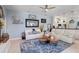 Comfortable living room featuring modern decor, neutral colors, and an open layout at 13136 Peregrin Cir, Bradenton, FL 34212