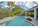 Stunning screened pool with integrated spa and convenient patio access at 13136 Peregrin Cir, Bradenton, FL 34212