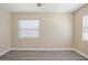 This is a bedroom with a window and a neutral wall color scheme at 3645 6Th S St, St Petersburg, FL 33705