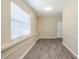 This spacious hallway offers plenty of natural light from the large window at 3645 6Th S St, St Petersburg, FL 33705