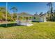 Gazebo in backyard near small building at 56 Ramblewood St, Port Charlotte, FL 33953