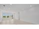 Bright room featuring tiled floors, large windows, and glass doors that provide ample natural light at 7338 N Ficus Tree, Punta Gorda, FL 33955