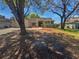 Charming single-story home featuring a well-maintained front yard and a classic exterior design at 8080 Spanish Oak Dr, Spring Hill, FL 34606
