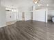 Open floor plan with wood floors at 8080 Spanish Oak Dr, Spring Hill, FL 34606