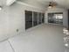 A large screened-in patio offers outdoor living space for entertainment and relaxation at 8080 Spanish Oak Dr, Spring Hill, FL 34606
