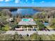 Aerial view of community amenities including pool, lake, and community center at 11805 Castine St, New Port Richey, FL 34654