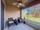 Relaxing screened porch with comfortable seating and a view of the serene outdoors at 11805 Castine St, New Port Richey, FL 34654