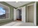 Bright bedroom with carpeted floors, a ceiling fan, and lots of natural light from the window at 1181 Burgos Dr # 406, Sarasota, FL 34238