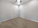 A large, empty bedroom is ready for your personal touch with its neutral carpet at 8110 Enclave Way # 101, Sarasota, FL 34243