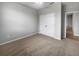 Neutral bedroom featuring a double door closet at 8110 Enclave Way # 101, Sarasota, FL 34243