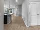 Modern kitchen with a breakfast bar and tile flooring at 8110 Enclave Way # 101, Sarasota, FL 34243