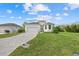 Charming single-Gathering home with manicured lawn and paved driveway at 7443 S Seagrape Rd, Punta Gorda, FL 33955