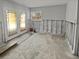 Sunroom shown during remodeling stages, with door to backyard and window at 141 81St N Ave, St Petersburg, FL 33702