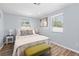 Well-lit bedroom with a comfortable bed, side tables, and an inviting ambiance at 1805 Rita St, Sarasota, FL 34231