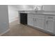 Kitchen featuring white cabinetry and countertops with stainless steel appliances and fixtures at 8869 White Sage Loop, Lakewood Ranch, FL 34202