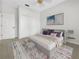 This bedroom features new carpet, natural light, and a spacious closet at 11535 52Nd E Ct, Parrish, FL 34219