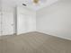 Bedroom with new carpeting and double closet doors at 11535 52Nd E Ct, Parrish, FL 34219