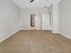 Spacious bedroom with neutral carpet and light gray walls provides a blank canvas for personalization at 11535 52Nd E Ct, Parrish, FL 34219