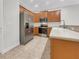 Spacious kitchen featuring stainless steel appliances and plenty of cabinet space at 11535 52Nd E Ct, Parrish, FL 34219