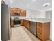 This kitchen boasts new stainless steel appliances, a modern sink, and lots of storage at 11535 52Nd E Ct, Parrish, FL 34219