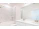 Clean bathroom featuring a shower/tub combination and a double sink vanity at 25372 Alicante Dr, Punta Gorda, FL 33955