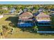 Home features a screened in pool and patio with a spacious backyard and fence at 31028 Baclan Dr, Wesley Chapel, FL 33545