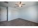 Bright bedroom featuring a closet and ceiling fan, providing a comfortable private space at 31028 Baclan Dr, Wesley Chapel, FL 33545