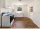 Functional eat-in kitchen featuring white cabinetry and a window above the sink at 120 W Wildwood St, Tampa, FL 33613