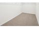Spacious walk-in closet features neutral carpet and wire shelving for optimal storage at 31653 Wild Grape Ln, Brooksville, FL 34602