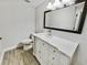 Bright bathroom features a stylish vanity with a marble countertop and modern fixtures at 4907 E Clifton St, Tampa, FL 33610