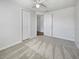 Bedroom with a ceiling fan and a closet with bi-fold doors at 6804 11Th W St, Bradenton, FL 34207