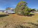 Charming house with a welcoming porch and nicely landscaped yard at 6804 11Th W St, Bradenton, FL 34207