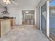 Open-concept kitchen with tile floors and access to outdoor patio at 6804 11Th W St, Bradenton, FL 34207