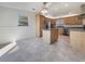Kitchen featuring stainless steel appliances, an island and tile floors at 6804 11Th W St, Bradenton, FL 34207