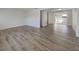 Bright living room with attractive wood-look floors and white trim at 6804 11Th W St, Bradenton, FL 34207