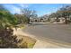 Street view of a row of townhomes with well-maintained landscaping and parking at 9665 Tara Cay Ct # 41, Seminole, FL 33776