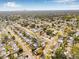 Overhead view of the neighborhood showing the home's location within a residential area with mature trees at 5980 32Nd N Ave, St Petersburg, FL 33710
