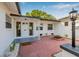Inviting front entrance with a well-lit porch and decorative landscaping offering curb appeal at 5980 32Nd N Ave, St Petersburg, FL 33710