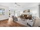 Bright and inviting living room features hardwood floors, modern decor, and ample natural light at 5980 32Nd N Ave, St Petersburg, FL 33710
