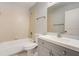 Neutral bathroom featuring a bathtub, updated vanity, and mirrored wall cabinet at 6262 142Nd N Ave # 1203, Clearwater, FL 33760
