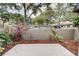 Private patio space with nice hardscape, colorful plants, and serene outdoor ambiance at 6262 142Nd N Ave # 1203, Clearwater, FL 33760