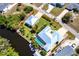 Aerial view of a waterfront home with a pool and boat dock, highlighted by a red boundary line at 3215 Peace River Dr, Punta Gorda, FL 33983