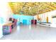 A spacious garage offers ample storage, epoxy flooring, and open beam ceilings at 3215 Peace River Dr, Punta Gorda, FL 33983