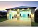 Spacious garage with an immaculate workshop, multiple doors, and abundant lighting for any hobbyist or car enthusiast at 3215 Peace River Dr, Punta Gorda, FL 33983