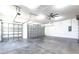 Spacious three car garage with high ceilings and potential for storage and customization at 3215 Peace River Dr, Punta Gorda, FL 33983