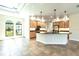 Modern kitchen featuring granite countertops, stainless steel appliances, and ample cabinet space at 3215 Peace River Dr, Punta Gorda, FL 33983