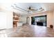 Expansive living area connecting to the kitchen and screened lanai at 3215 Peace River Dr, Punta Gorda, FL 33983