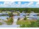 Aerial view showcasing the home's location, surrounding streets, and landscaping details at 3803 Pin Oaks St, Sarasota, FL 34232