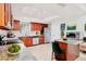 Well-equipped kitchen with sleek countertops, stainless steel appliances, and ample cabinet space at 3803 Pin Oaks St, Sarasota, FL 34232