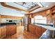 Bright kitchen with stainless steel appliances, custom cabinets and countertops at 5900 Leeland S St, St Petersburg, FL 33715